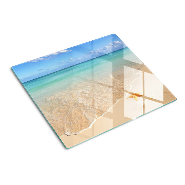Tabla de cortar de cristal Playa con conchas y olas