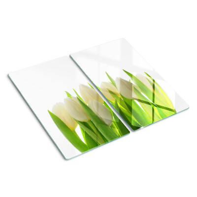 Tabla de cortar de cristal Tulipanes sobre un fondo de hojas verdes.