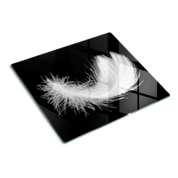Tabla para cortar Pluma sobre fondo negro