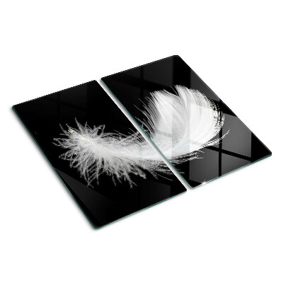 Tabla para cortar Pluma sobre fondo negro