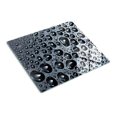 Tabla de cortar de cristal Gotas de agua sobre el vidrio