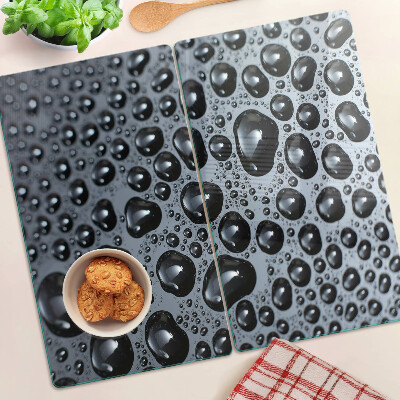Tabla de cortar de cristal Gotas de agua sobre el vidrio