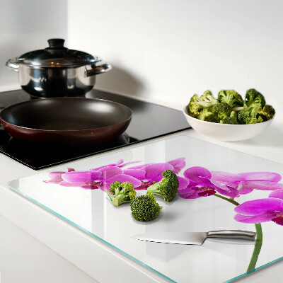 Tabla para cortar Flores de orquídea en tonos rosa.