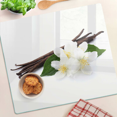 Tabla de cortar de cristal flores y vainas de vainilla
