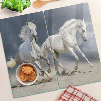 Tabla de cortar de cristal Caballos blancos en fuga