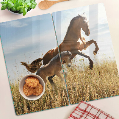 Tabla para cortar Caballos en un prado al sol