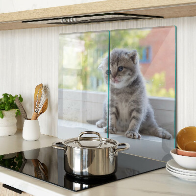 Tabla para cortar Gatito en el alféizar de la ventana