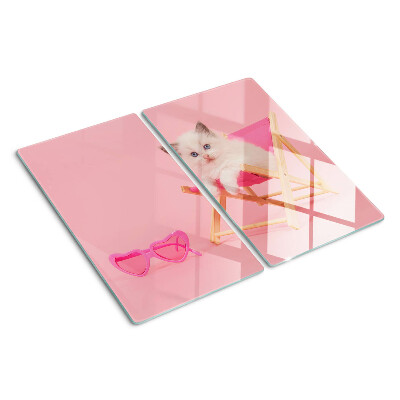 Tabla de cortar de cristal Gatito en una tumbona sobre un fondo rosa