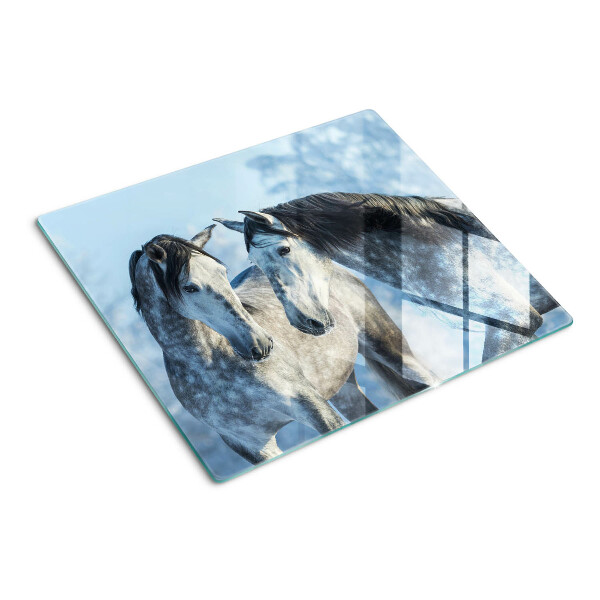 Tabla para cortar Caballos en un paisaje invernal