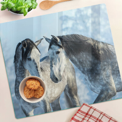 Tabla para cortar Caballos en un paisaje invernal