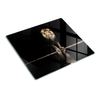 Tabla para cortar León sobre un fondo oscuro