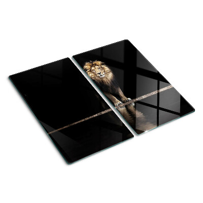 Tabla para cortar León sobre un fondo oscuro