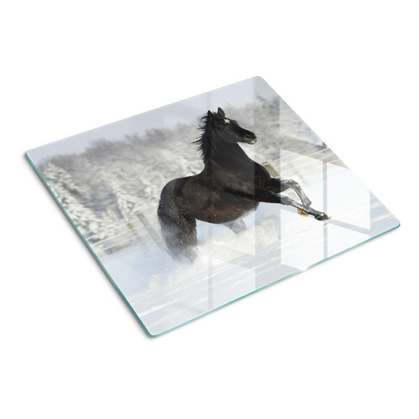Tabla de cortar de cristal Un caballo en un paisaje invernal.