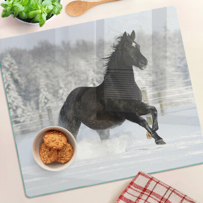 Tabla de cortar de cristal Un caballo en un paisaje invernal.