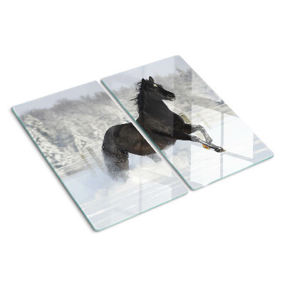 Tabla de cortar de cristal Un caballo en un paisaje invernal.