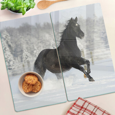 Tabla de cortar de cristal Un caballo en un paisaje invernal.