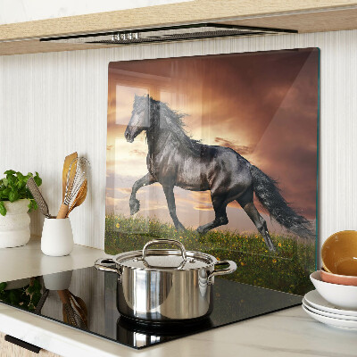 Tabla para cortar Un caballo con el sol poniente como telón de fondo