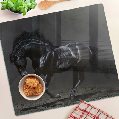 Tabla de cortar de cristal Caballo oscuro en movimiento