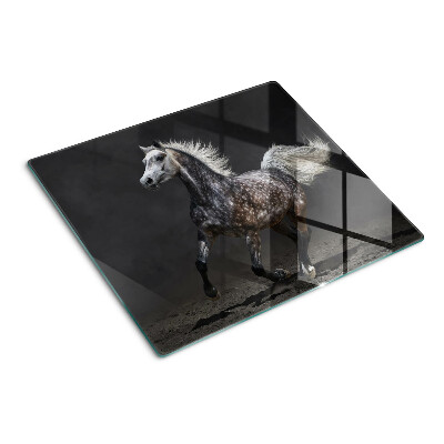 Tabla para cortar Un caballo moteado en fuga