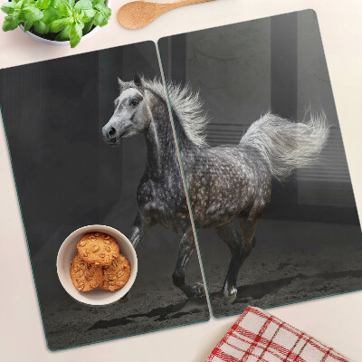 Tabla para cortar Un caballo moteado en fuga