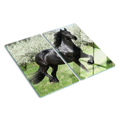 Tabla de cortar de cristal Caballo negro en el prado