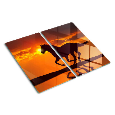Tabla de cortar de cristal Un caballo con el sol poniente como telón de fondo