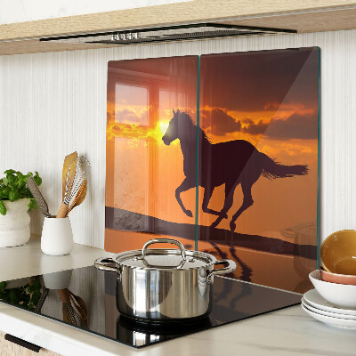 Tabla de cortar de cristal Un caballo con el sol poniente como telón de fondo