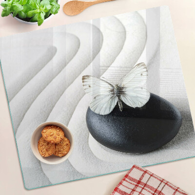 Tabla para cortar Motivo de mariposa sobre piedra