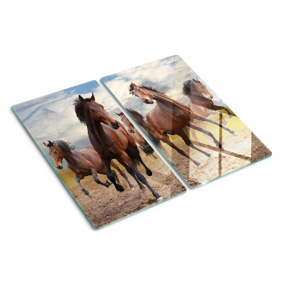 Tabla para cortar Caballos corriendo en el pasto