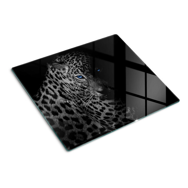 Tabla de cortar de cristal Pantera izquierda con ojos azules.