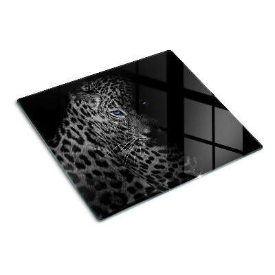 Tabla de cortar de cristal Pantera izquierda con ojos azules.