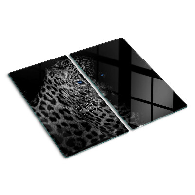 Tabla de cortar de cristal Pantera izquierda con ojos azules.