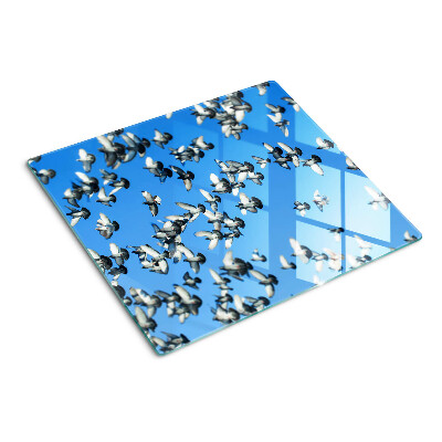 Tabla de cortar de cristal Palomas volando en el cielo