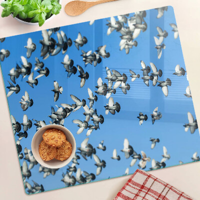 Tabla de cortar de cristal Palomas volando en el cielo