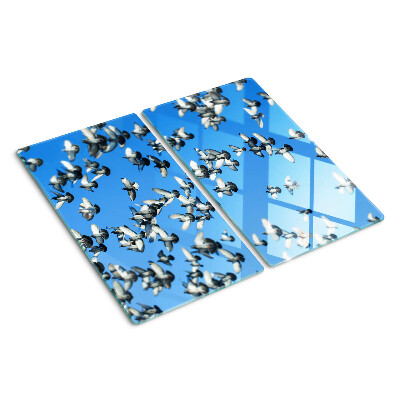 Tabla de cortar de cristal Palomas volando en el cielo