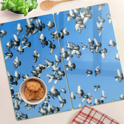 Tabla de cortar de cristal Palomas volando en el cielo