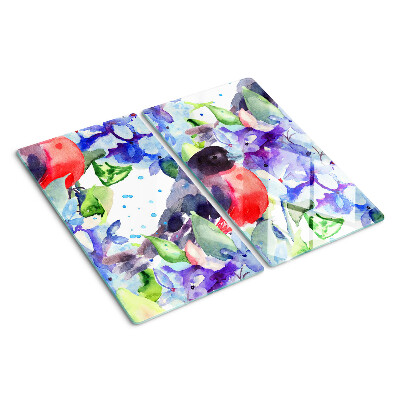 Tabla de cortar de cristal Pájaro sobre un fondo de flores.