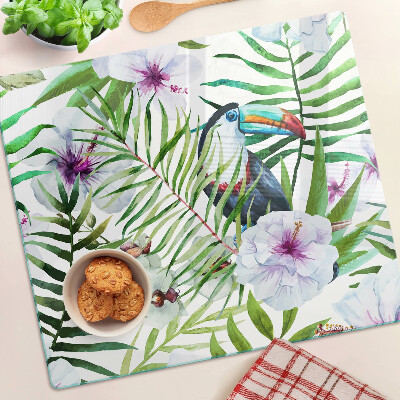 Tabla para cortar Motivo tropical con pájaros y plantas.