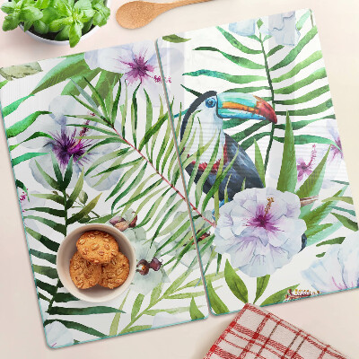 Tabla para cortar Motivo tropical con pájaros y plantas.