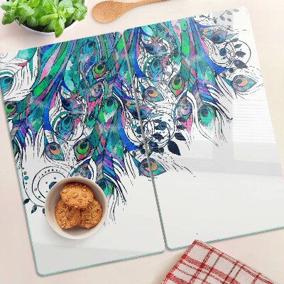Tabla de cortar de cristal Plumas de pavo real en colores verde y azul.