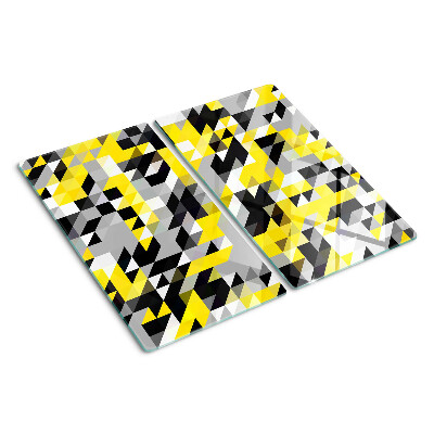 Tabla para cortar Geometría en tonos amarillos y negros.