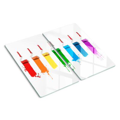 Tabla para cortar Un arcoíris de pinturas en pinceles.