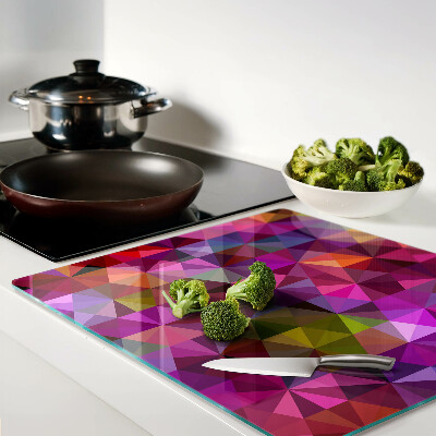 Tabla para cortar Geometría en tonos rosa y morado.