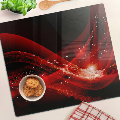 Tabla de cortar de cristal Ondas rojas con efecto de luz.