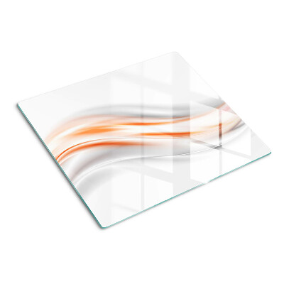 Tabla de cortar de cristal Ondas en tonos naranja y gris.