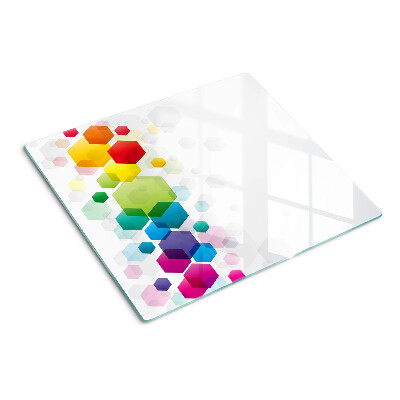 Tabla para cortar Hexágonos coloridos en el fondo.
