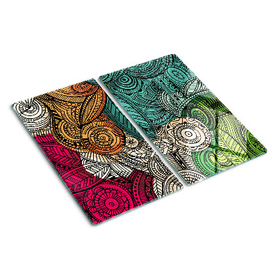 Tabla de cortar de cristal Motivo de mandala con patrones coloridos.