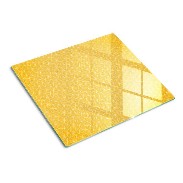 Tabla para cortar Flor de la vida sobre fondo amarillo
