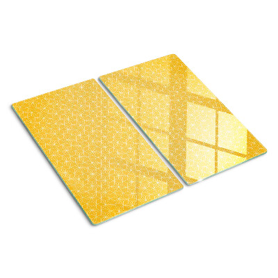 Tabla para cortar Flor de la vida sobre fondo amarillo