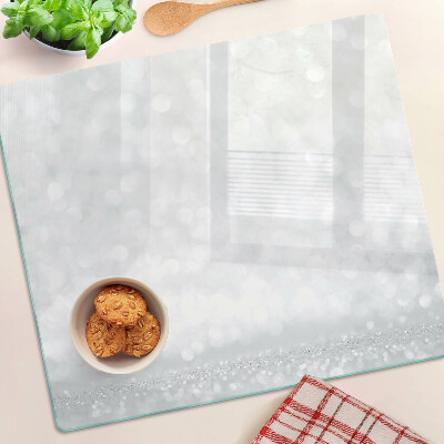 Tabla para cortar Bokeh brillante con efecto de luz